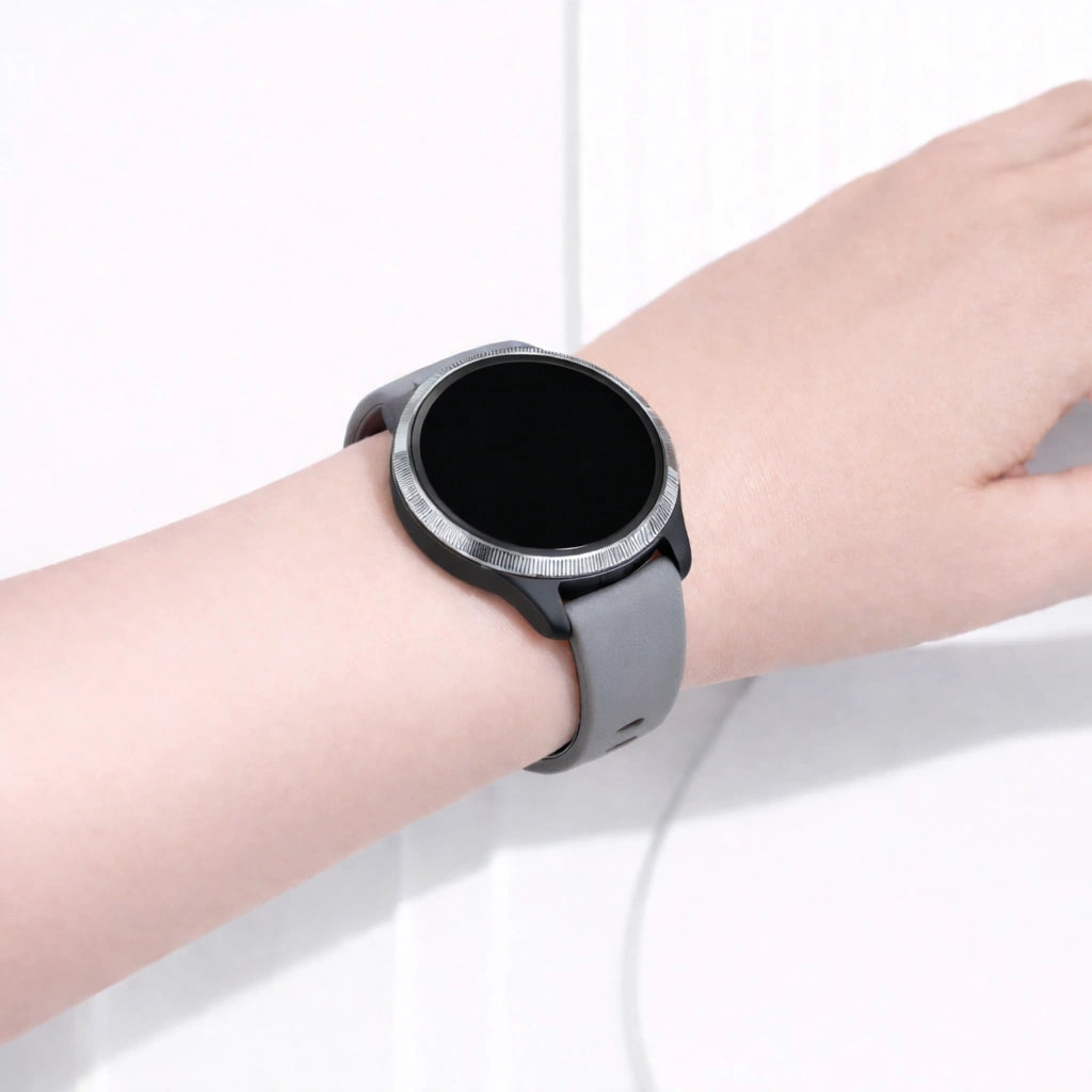 Garmin Venu smartwatch worn with a grey silicone sport band
