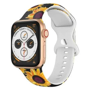 Black Apple Watch band with bright sunflower pattern and white buckle connector
