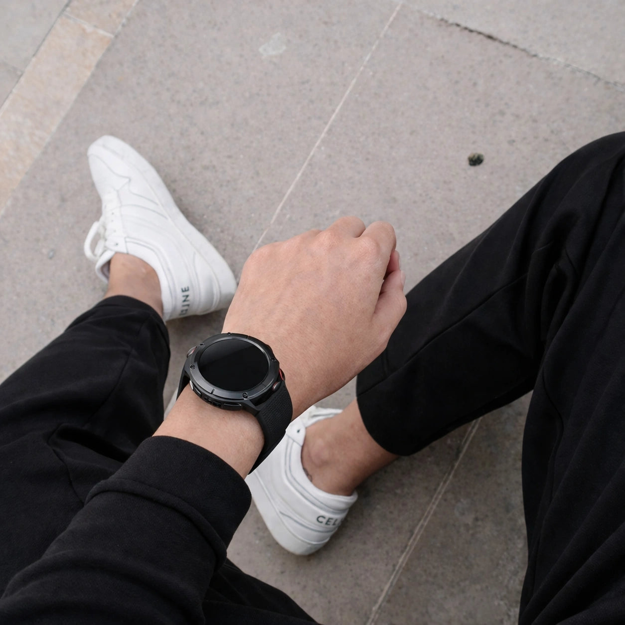 Black Garmin Fenix 6 band on wrist for everyday wear