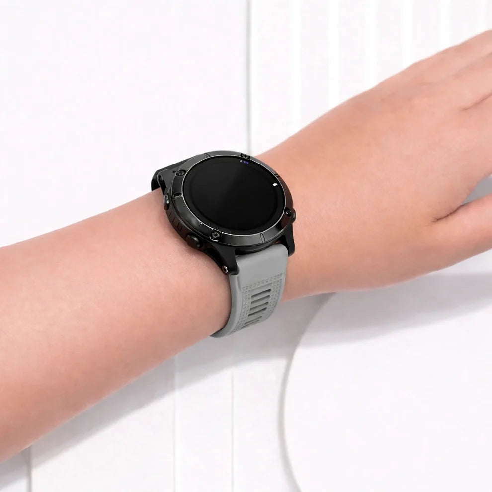 Grey Garmin Epix Gen 2 silicone watch strap worn on the wrist for an understated everyday look.