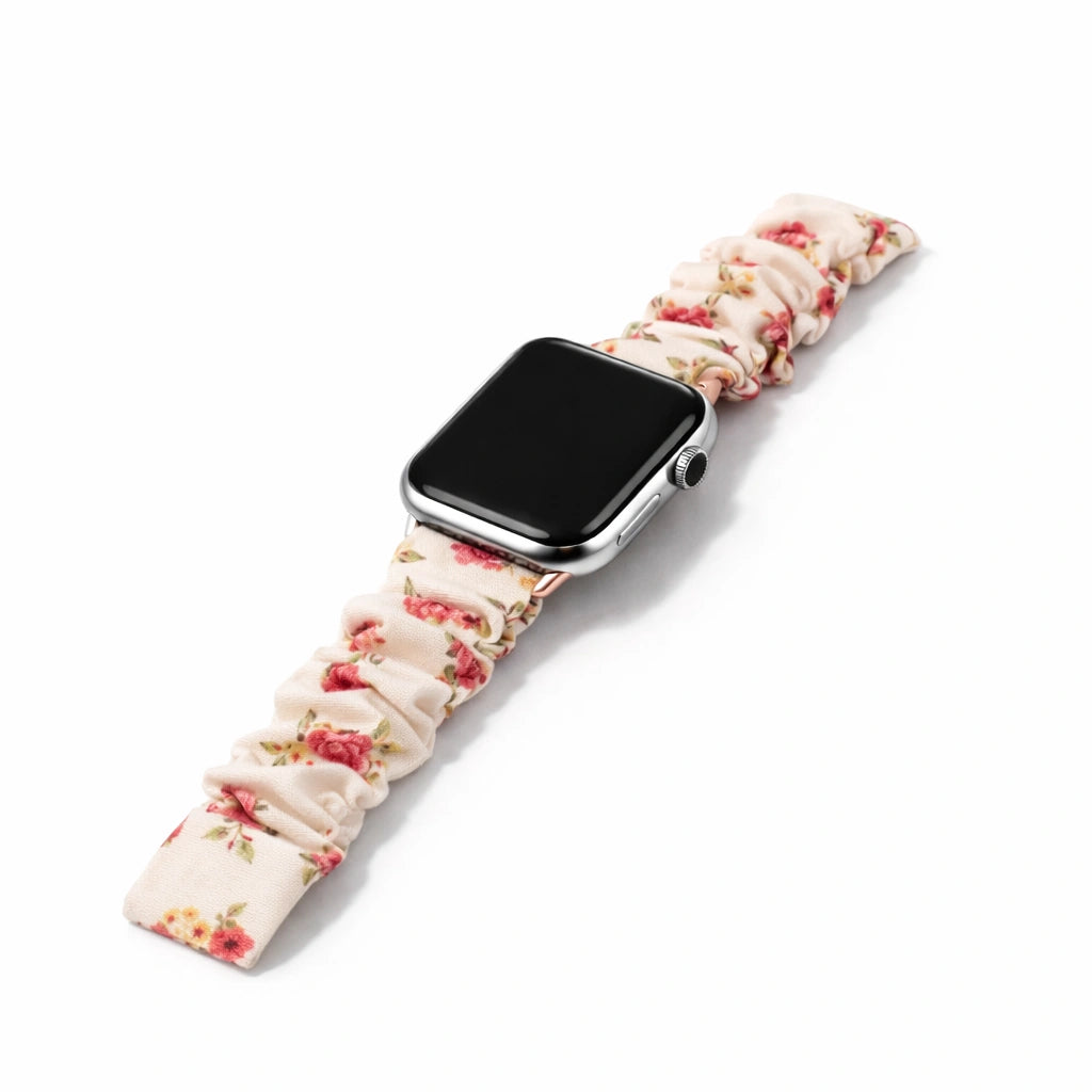 Pink floral scrunchie Apple Watch band with soft elastic fabric and delicate flower pattern