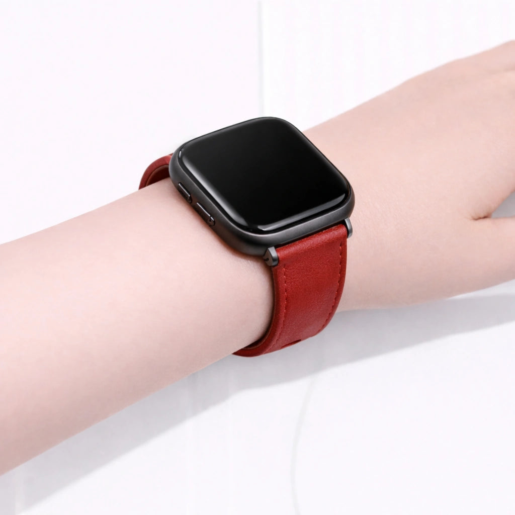 Red leather wristband fitted to a Fitbit Versa 2 showing a snug and comfortable everyday fit