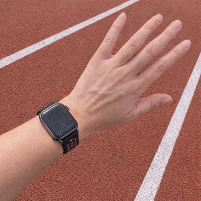 Apple Watch band worn during outdoor exercise, showing how straps stay secure on active wrists