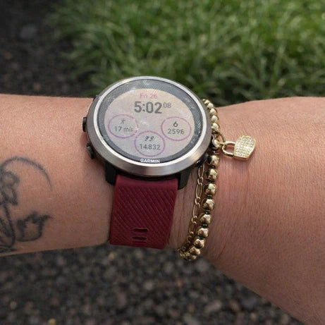 Textured wine red silicone Garmin watch strap showing durable material designed for everyday wear