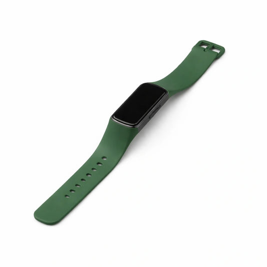 Pine green silicone strap for Fitbit Charge 5 showing secure fit and durable design
