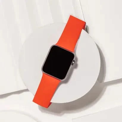 Bold red strap made for Apple Watch SE, crafted from soft and flexible silicone.