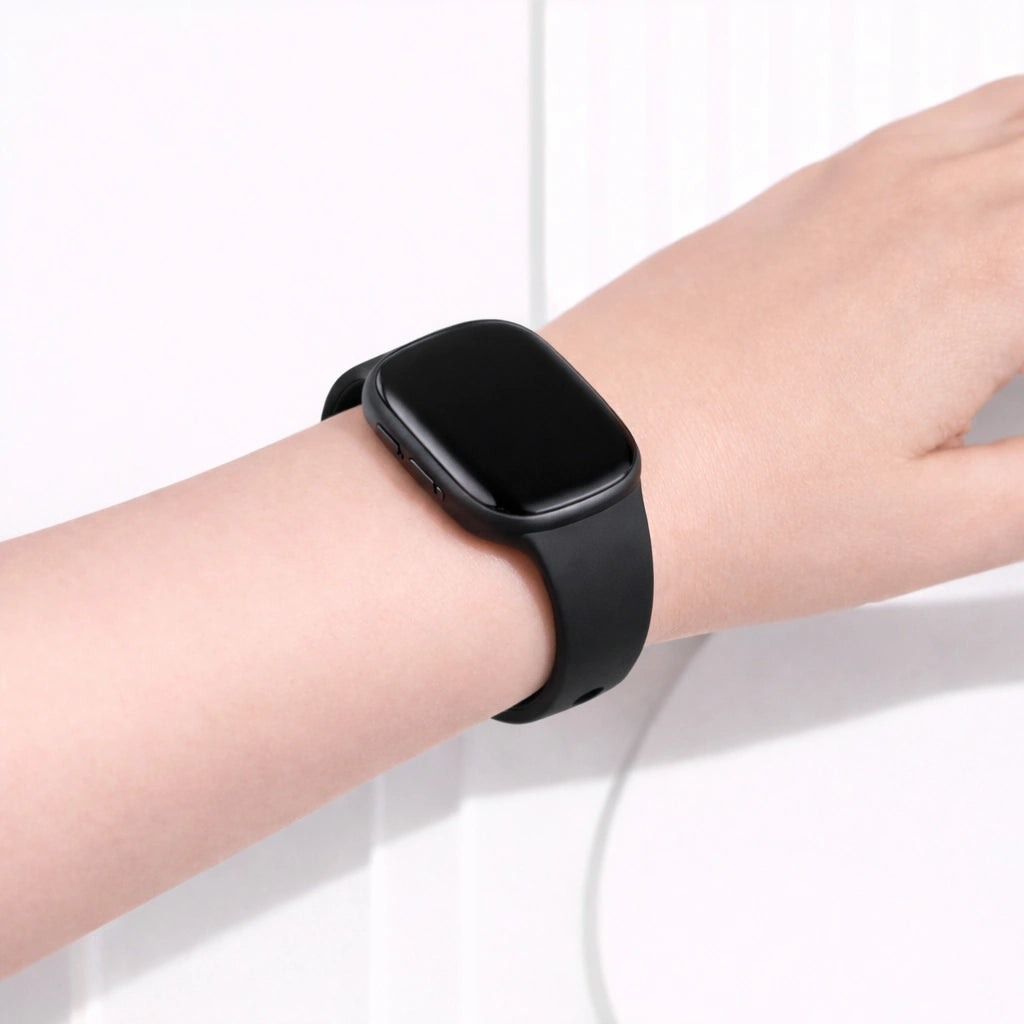 Black replacement strap for Fitbit Versa 3 fitted securely on the wrist