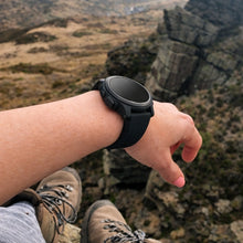 Garmin Fenix 6 straps black worn outdoors on wrist during hiking