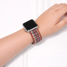 Bohemian style scrunchie Apple Watch band worn on wrist with colourful fabric design