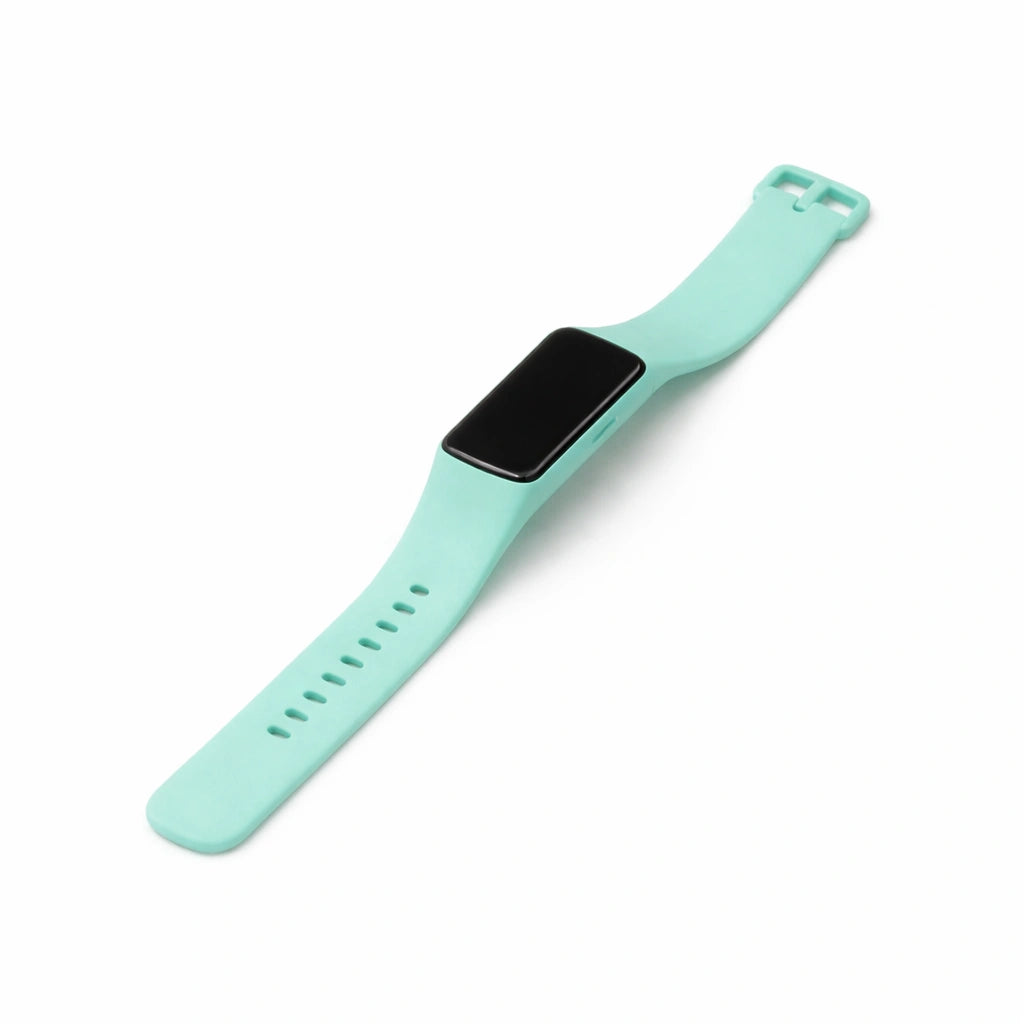 Mint silicone watch band compatible with Fitbit Charge 5 on a clean background