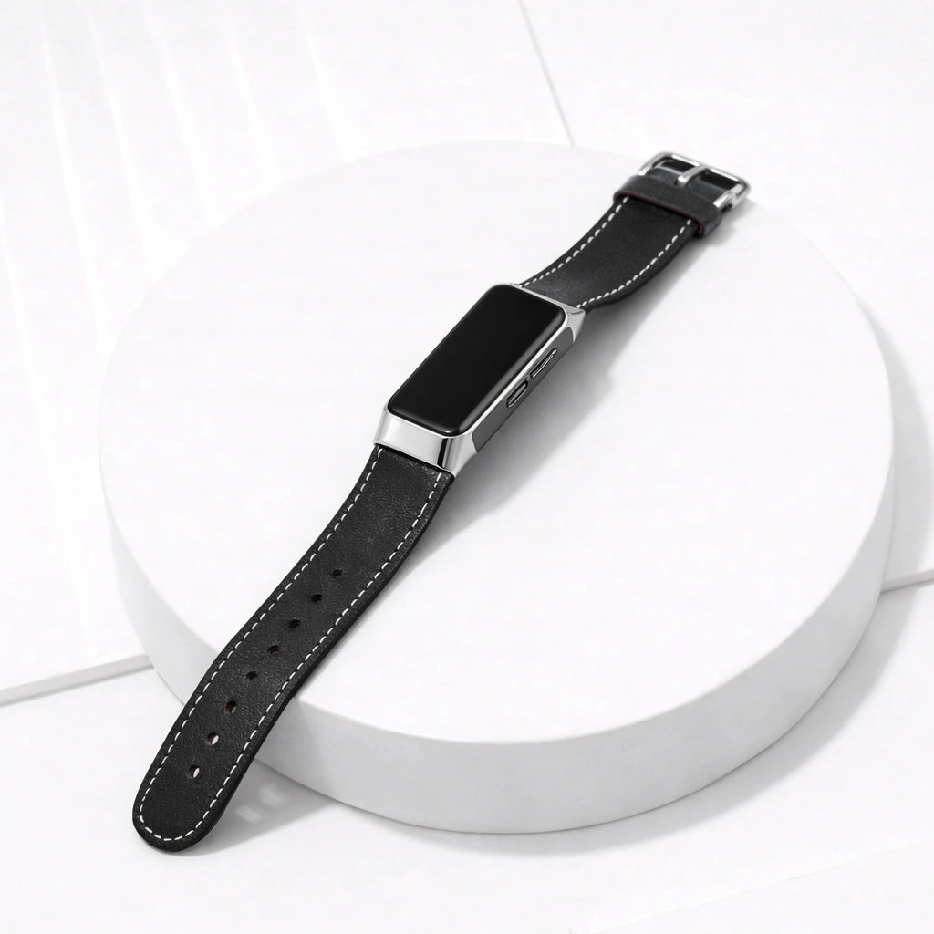 Black leather strap for Fitbit Charge 5 shown on a clean flatlay display