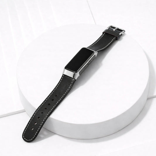 Black leather strap for Fitbit Charge 5 shown on a clean flatlay display