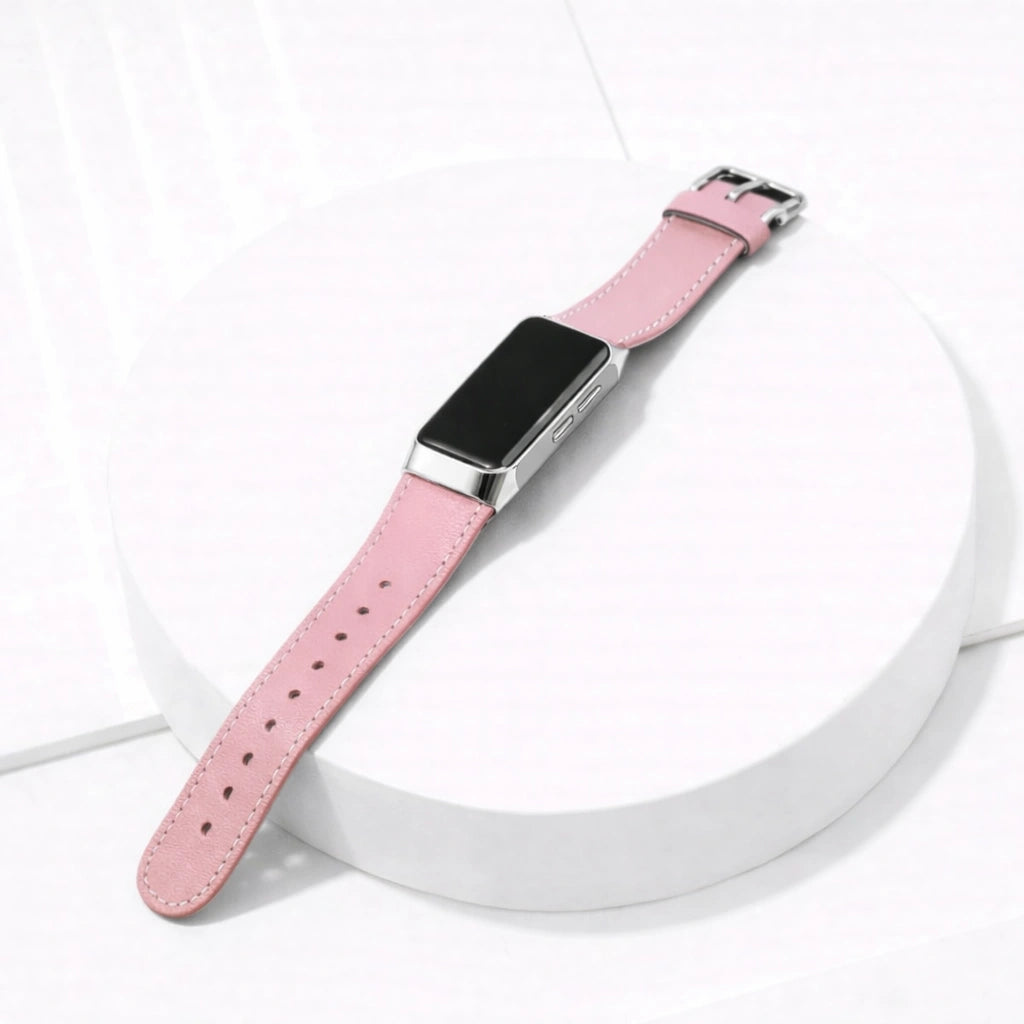 Pink leather strap for Fitbit Charge 5 shown on a clean flatlay display