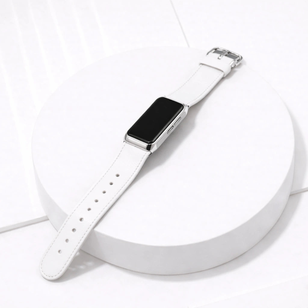 Fitbit Charge 5 white leather watch strap shown on white platform