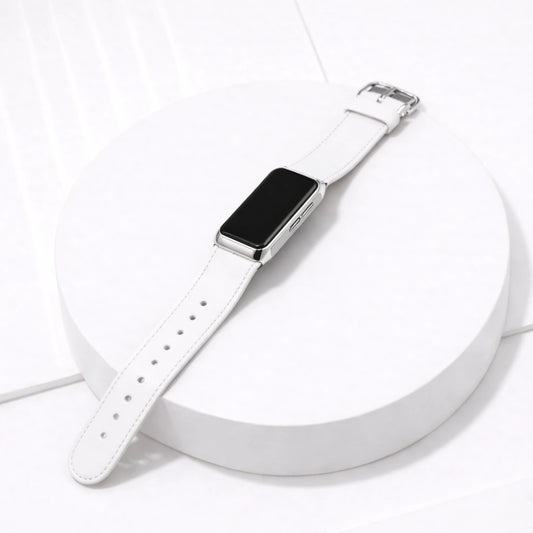 Fitbit Charge 5 white leather watch strap shown on white platform