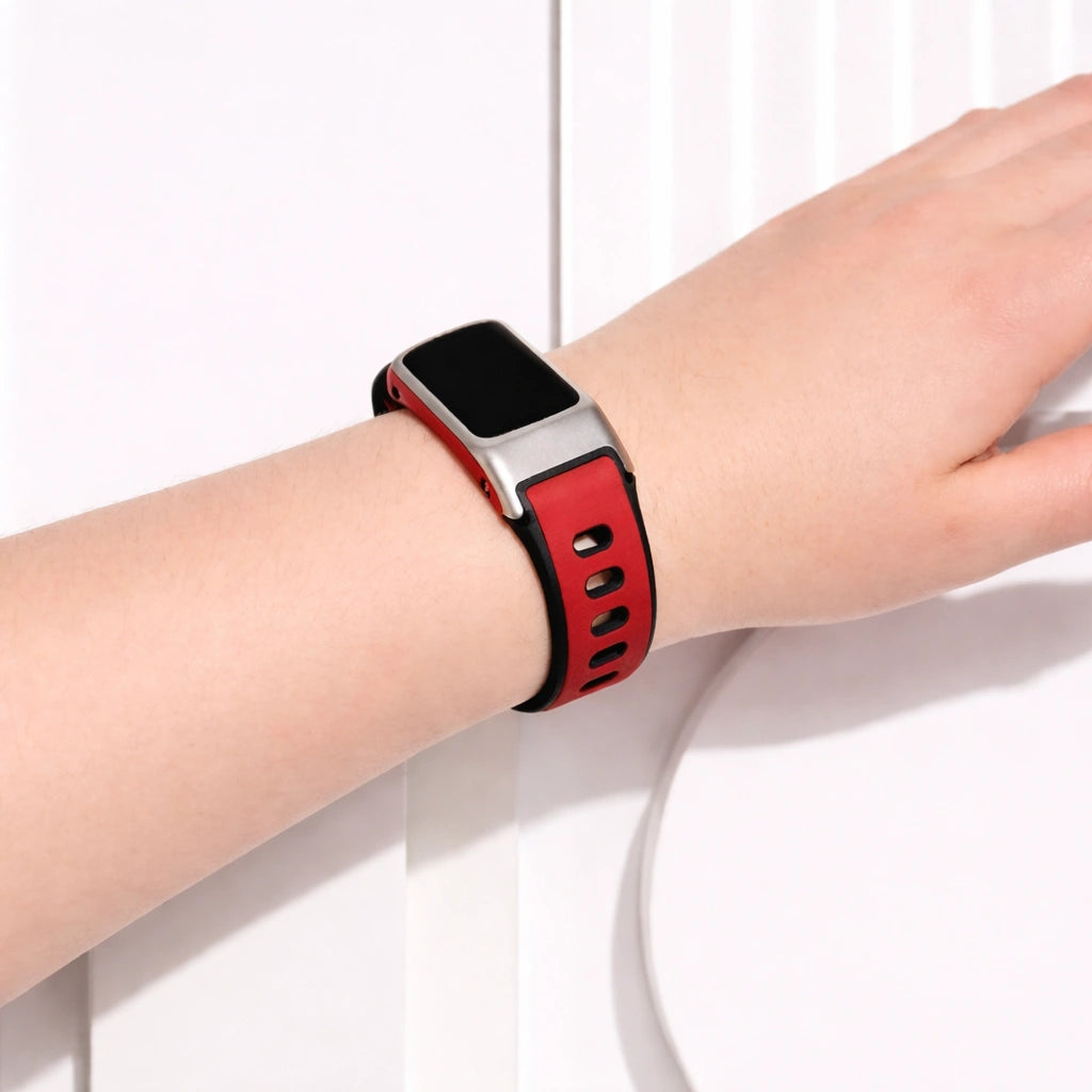 Red and black sports strap for Fitbit Charge 5 worn on wrist showing secure fit and sporty design
