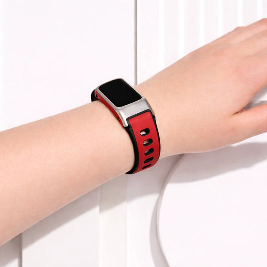 Red and black sports strap for Fitbit Charge 5 worn on wrist showing secure fit and sporty design