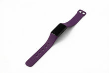 Dark purple silicone band designed to fit the Fitbit Charge 6 fitness tracker
