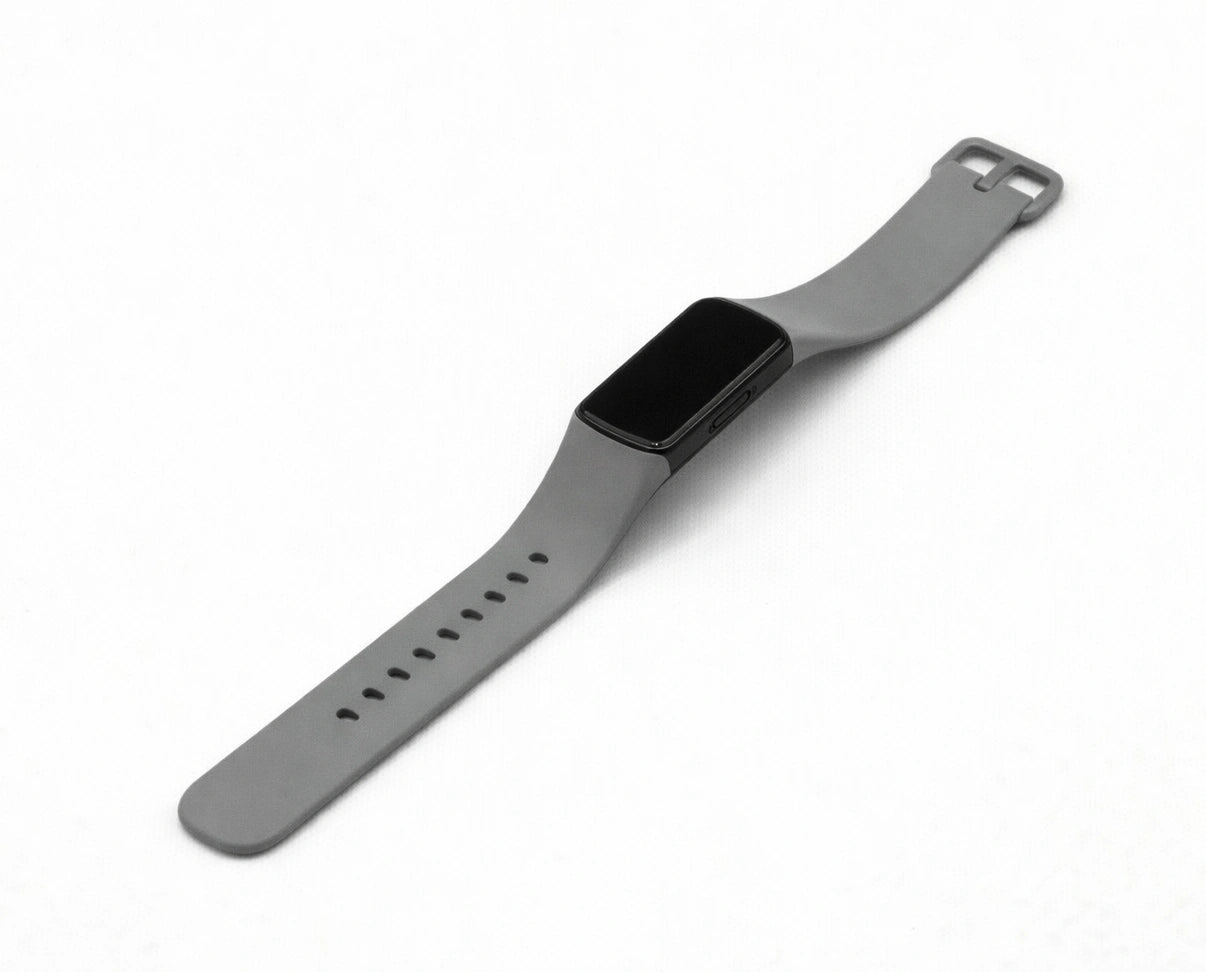Grey silicone band designed to fit the Fitbit Charge 6 fitness tracker