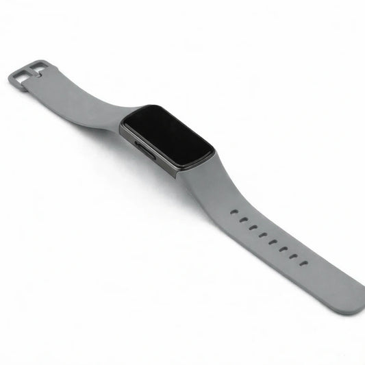 Grey silicone strap for Fitbit Charge 6 shown in a clean flat lay on a white background