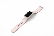 Light pink silicone band designed to fit the Fitbit Charge 6 fitness tracker