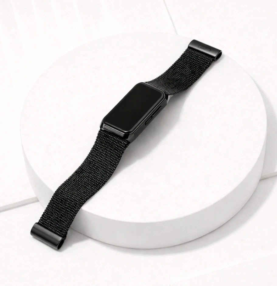 Metallic black mesh strap for Fitbit Charge 6 shown laying flat on a white surface