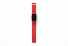 Red silicone band for Fitbit Charge 6 shown on a white background