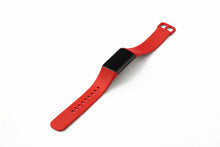 Red silicone strap designed to fit the Fitbit Charge 6 fitness tracker