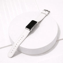 White leather replacement band for Fitbit Charge 6 shown laying flat