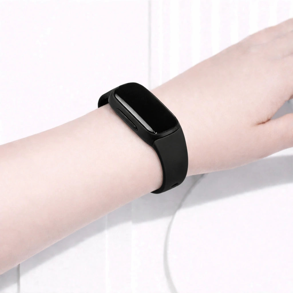 Black Fitbit Inspire 2 band worn on the wrist for everyday comfort