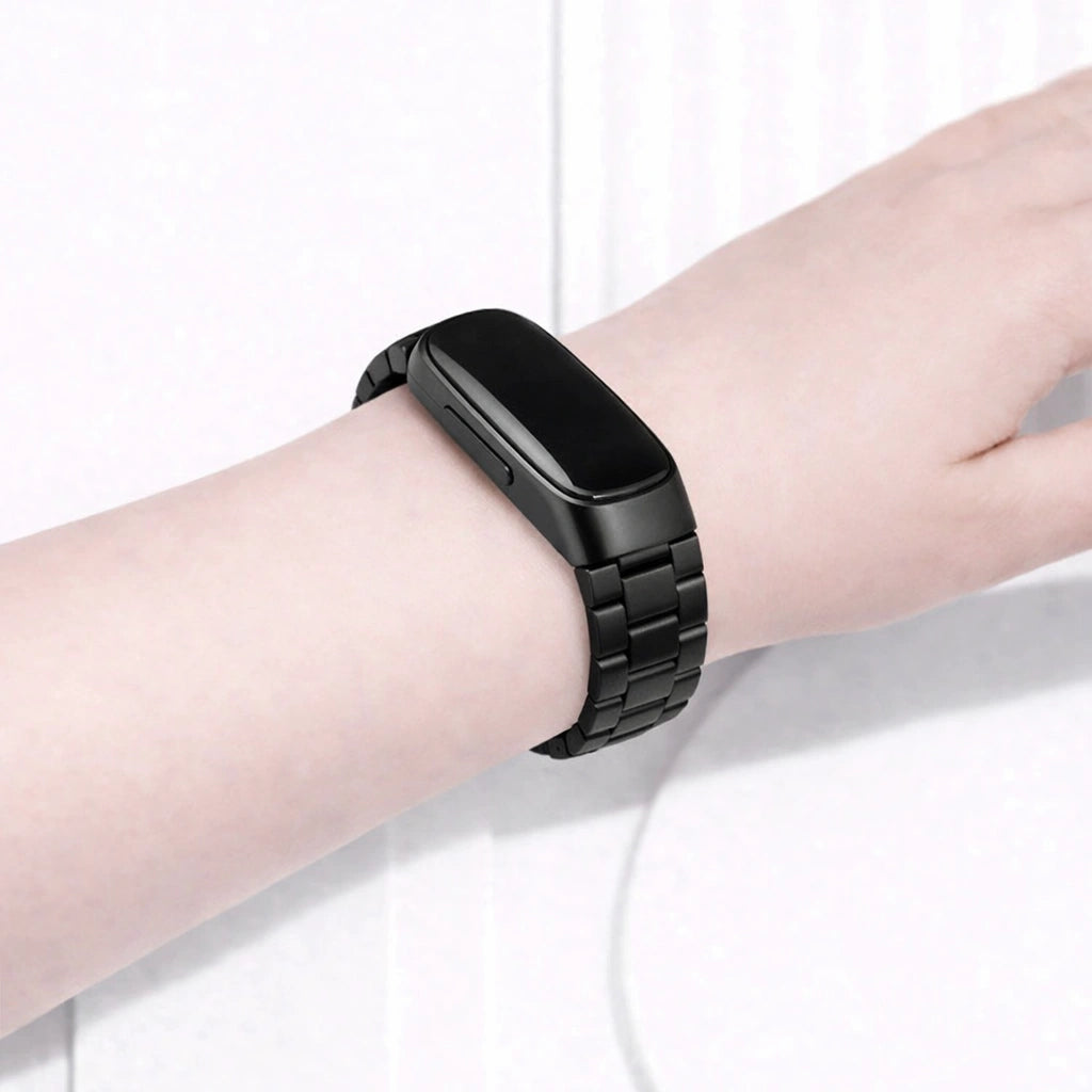 Black metal strap on wrist for Fitbit Inspire 2 with stainless steel links