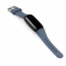 Grey watch strap for Fitbit Inspire 2 shown with tracker attached