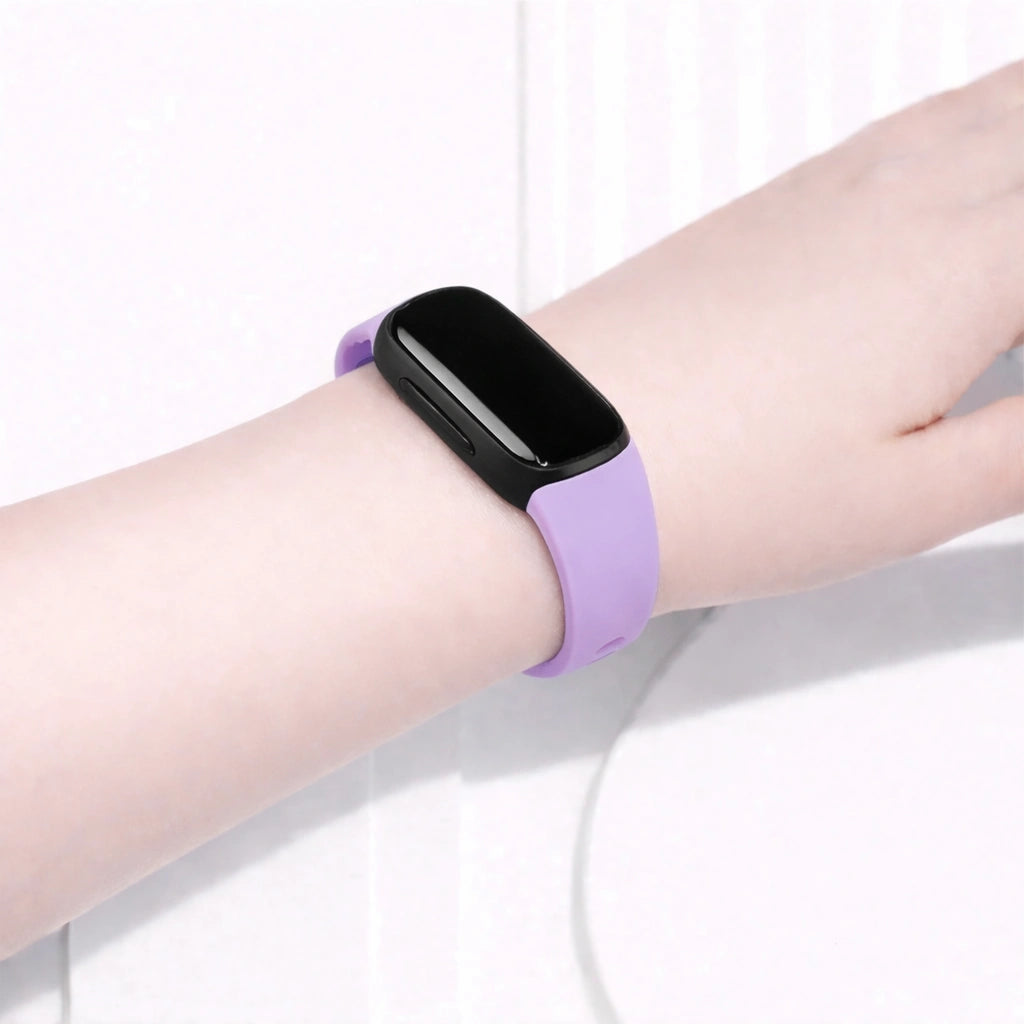 Lilac Fitbit Inspire 2 band worn on the wrist for a soft, comfortable feel