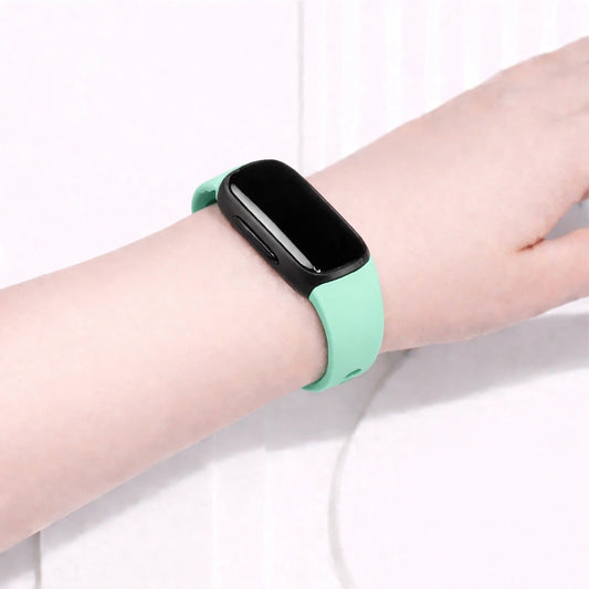 Mint Fitbit Inspire 2 band worn on the wrist for a comfortable everyday fit