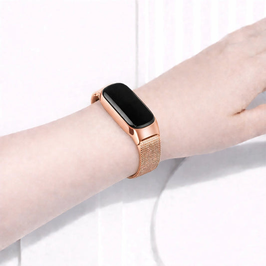 Rose gold metal band for Fitbit Inspire 2 worn on the wrist for an elegant look