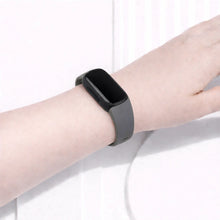 Grey watch band for Fitbit Inspire 3 shown on the wrist