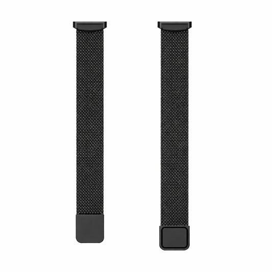 Metal black mesh Fitbit Luxe bands shown in flat lay with magnetic clasp and connector ends