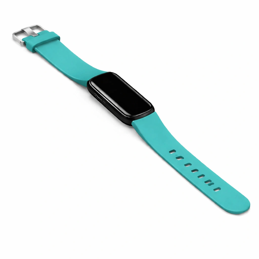 Mint Fitbit Luxe wristband attached to tracker with smooth matte finish