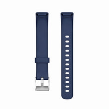 Navy blue silicone strap compatible with Fitbit Luxe shown on white background