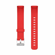 Red silicone watch strap compatible with Fitbit Luxe shown on white background