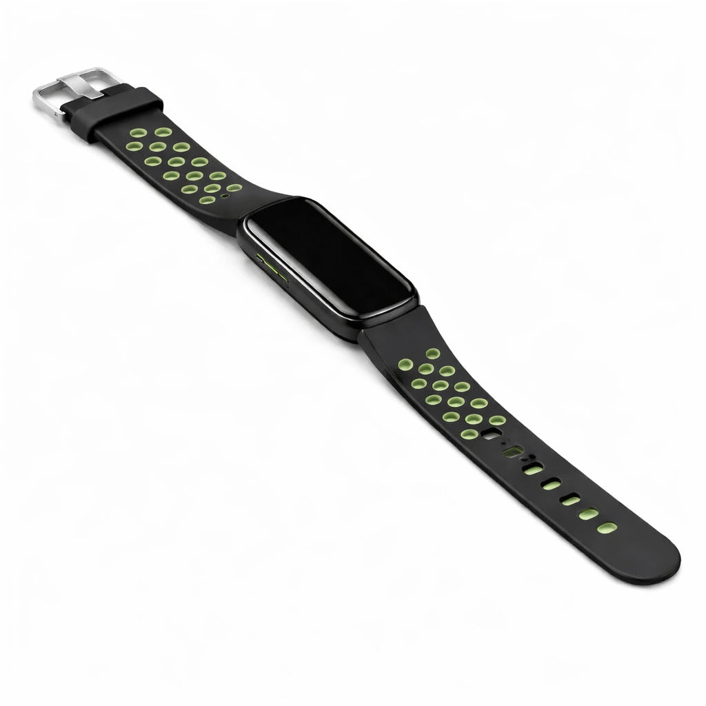 Flat lay image of Fitbit luxe sports strap in black and green attached to device
