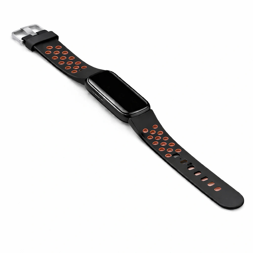 Sports style Fitbit Luxe band with perforated breathability holes attached to tracker.
