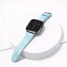 Mint leather strap for Fitbit Versa 3 with adjustable stainless steel buckle and clean flat-lay design