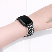 Skull print watch band for Fitbit Versa 4 worn on wrist