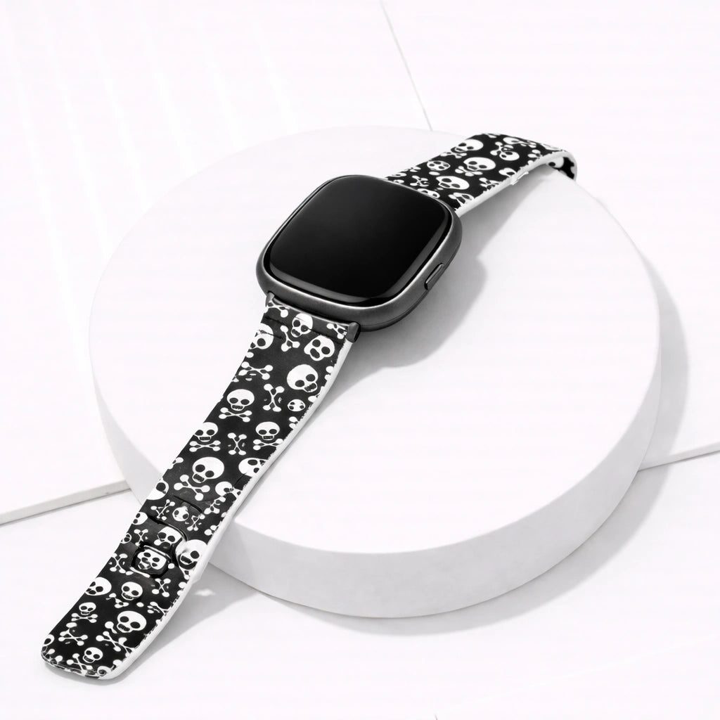 Skull print silicone watch strap for Fitbit Versa 4 displayed on a white background