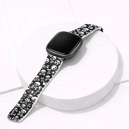 Skull print silicone watch strap for Fitbit Versa 4 displayed on a white background