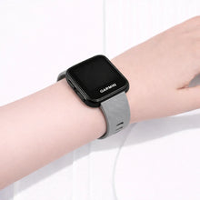 Grey Garmin Forerunner 35 band worn on wrist for everyday comfort and secure fit