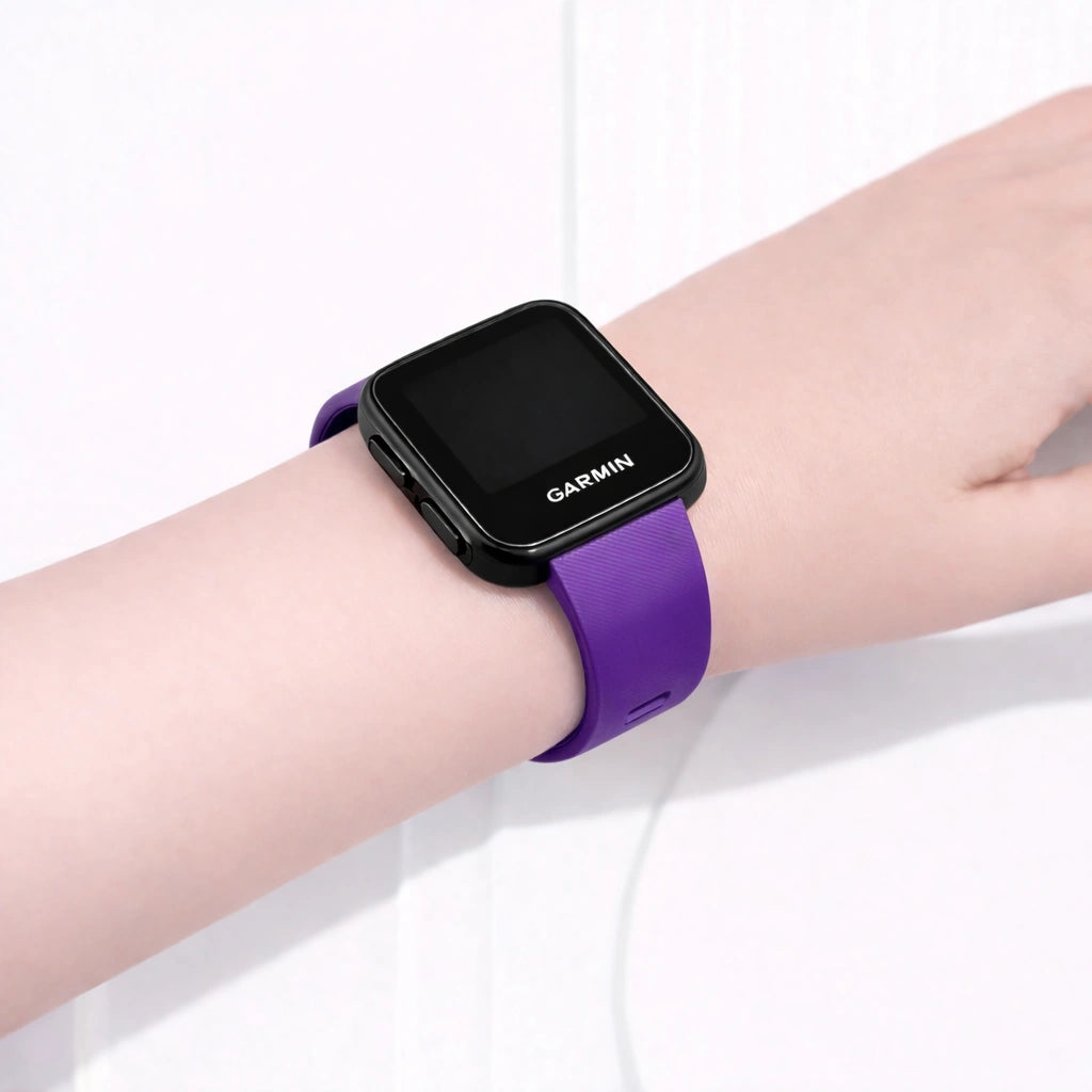Purple Garmin Forerunner 35 watch band worn on the wrist with a secure, comfortable fit