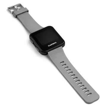 Grey Garmin Forerunner watch strap fitted to a black round watch, laid flat on a white background
