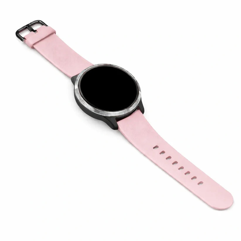 A light pink coloured Garmin Venu watch band fitted to a round watch with a silver bezel, shown laid flat
